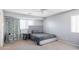 Bedroom featuring a plush carpet, ceiling fan, and natural lighting at 16918 W Statler St, Surprise, AZ 85388