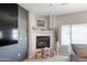 Modern fireplace featuring a white mantle and hearth at 16918 W Statler St, Surprise, AZ 85388
