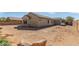 Backyard featuring desert landscaping at 17462 W Straight Arrow Ln, Surprise, AZ 85387