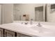 Bathroom vanity featuring white countertops and cabinetry and neutral paint at 17462 W Straight Arrow Ln, Surprise, AZ 85387
