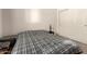 Standard bedroom with neutral walls, closet, and natural light at 17462 W Straight Arrow Ln, Surprise, AZ 85387