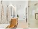 Bright bathroom featuring modern vanity, stylish mirror, a tub and shower combination, and a walk-in shower at 17473 N 167Th Dr, Surprise, AZ 85374