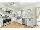 Well-lit kitchen with stainless steel appliances and white subway tile backsplash at 17473 N 167Th Dr, Surprise, AZ 85374
