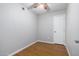 A cozy bedroom with laminate flooring, ceiling fan and a simple design at 18202 N Cave Creek Rd # 134, Phoenix, AZ 85032