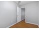 A cozy bedroom with laminate flooring, ceiling fan and a simple design at 18202 N Cave Creek Rd # 134, Phoenix, AZ 85032