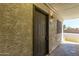 Building exterior shows unit door with security screen at 18202 N Cave Creek Rd # 134, Phoenix, AZ 85032