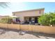 Well-maintained backyard featuring a cozy patio area and drought-tolerant landscaping at 19427 N 84Th Ave, Peoria, AZ 85382