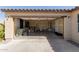 Spacious garage with an open door, offering ample room for storage and vehicles at 2021 E Velvet Pl, Casa Grande, AZ 85122