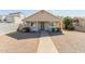 Lovely single-story home with a low-maintenance desert landscape in the front yard at 2033 W Adams St, Phoenix, AZ 85009