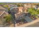 Home showcasing desert landscaping, tile roof, and neighborhood setting at 2134 E Honeysuckle Pl, Chandler, AZ 85286