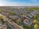 Aerial view of neighborhood showcasing various houses with street views and mountain views in the distance at 2134 E Honeysuckle Pl, Chandler, AZ 85286
