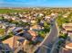 Aerial view of a neighborhood featuring well-maintained homes and mature landscaping at 2134 E Honeysuckle Pl, Chandler, AZ 85286