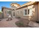 Charming courtyard featuring decorative stone, seating and lovely landscaping at 2134 E Honeysuckle Pl, Chandler, AZ 85286