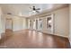 Open living area with tile floors, abundant natural light and french door access to patio at 2134 E Honeysuckle Pl, Chandler, AZ 85286