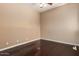 Spacious bedroom with hardwood floors, neutral walls, and ample natural light at 2453 E Ebony Dr, Chandler, AZ 85286