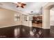 Open-concept living room with hardwood floors, connecting seamlessly to the kitchen area at 2453 E Ebony Dr, Chandler, AZ 85286