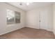 Bedroom with a ceiling fan and window at 25723 S Hawes Rd, Queen Creek, AZ 85142
