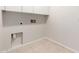 Laundry Room featuring tiled floors and hookups at 25723 S Hawes Rd, Queen Creek, AZ 85142