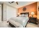 Comfortable bedroom with neutral tones, soft lighting, and a spacious closet at 26828 W Piute Ave, Buckeye, AZ 85396