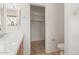 Bright bathroom featuring a sink and walk-in closet at 28933 N Saddle Way, San Tan Valley, AZ 85143
