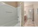 Bathroom with shower and bath features a shower curtain and tile floors at 28933 N Saddle Way, San Tan Valley, AZ 85143