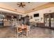 Inviting dining area with neutral color palette, open layout, and exterior exit to community space at 28933 N Saddle Way, San Tan Valley, AZ 85143