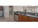 Functional kitchen featuring stainless steel dishwasher and generous counter space at 28933 N Saddle Way, San Tan Valley, AZ 85143