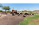 Outdoor picnic area with covered wagon detail at 28933 N Saddle Way, San Tan Valley, AZ 85143