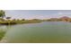 Scenic view of the pond and desert mountains at 28933 N Saddle Way, San Tan Valley, AZ 85143