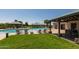Community pool with lounge chairs, gazebo, and covered sitting area for residents to enjoy on a sunny day at 28933 N Saddle Way, San Tan Valley, AZ 85143