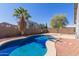 Sparkling in-ground backyard swimming pool at 28933 N Saddle Way, San Tan Valley, AZ 85143