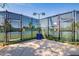 Community tennis courts with black chain link fencing and bright lighting for evening play at 28933 N Saddle Way, San Tan Valley, AZ 85143