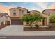 Charming two-story home with a well-manicured lawn and a convenient two-car garage at 31106 N 138Th Ave, Peoria, AZ 85383