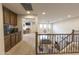 Cozy loft area featuring plush carpet, recessed lighting, and views of the living area below at 31106 N 138Th Ave, Peoria, AZ 85383