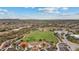 Aerial shot of a community park with green space, playground, and walking paths at 31106 N 138Th Ave, Peoria, AZ 85383