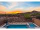 Inviting backyard pool and spa with desert landscape views offering a private oasis at 31106 N 138Th Ave, Peoria, AZ 85383