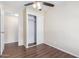 Bedroom with a sliding closet and wood-look flooring at 320 E Mckellips Rd # 166, Mesa, AZ 85201