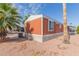 Single-story home with neutral toned exterior and a well maintained landscaped yard in a residential neighborhood at 320 E Mckellips Rd # 166, Mesa, AZ 85201