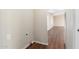 Hallway leading to an open living space and featuring a utility hookup at 320 E Mckellips Rd # 166, Mesa, AZ 85201