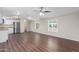 Spacious living room adjacent to the kitchen, featuring hardwood floors and plenty of natural light at 320 E Mckellips Rd # 166, Mesa, AZ 85201