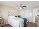 Bedroom showcasing bright decor, ceiling fan, and light colored walls at 320 E Mckellips Rd # 166, Mesa, AZ 85201