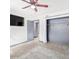 Main bedroom with a ceiling fan and a closet with hanging rod at 3227 E Enid Ave, Mesa, AZ 85204