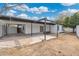 Expansive backyard with covered patio and potential for outdoor entertaining and landscaping at 3330 E Gelding Dr, Phoenix, AZ 85032