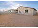 Large backyard with a block fence and the potential for landscaping or outdoor living at 3598 E Alexander Dr, San Tan Valley, AZ 85143