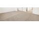 Bedroom showcases neutral carpet, white walls, offering a bright and airy space at 3598 E Alexander Dr, San Tan Valley, AZ 85143