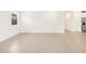 Spacious living room with neutral tile flooring and natural light at 3598 E Alexander Dr, San Tan Valley, AZ 85143
