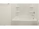 Clean shower-tub with a showerhead and some shelving at 3598 E Alexander Dr, San Tan Valley, AZ 85143
