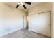 This bedroom features carpet, closet, and natural light at 44922 W Alamendras St, Maricopa, AZ 85139