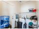 Laundry room featuring washer, dryer, shelving, and lots of storage at 44922 W Alamendras St, Maricopa, AZ 85139