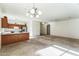 Spacious open floorplan combining living, dining, and kitchen areas for easy entertaining at 44922 W Alamendras St, Maricopa, AZ 85139